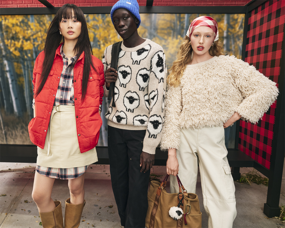 Three models styled in pieces from the Woolrich x Target collection